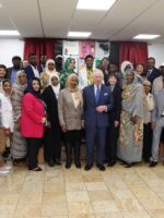 King Charles visits members of the Sudanese community in London